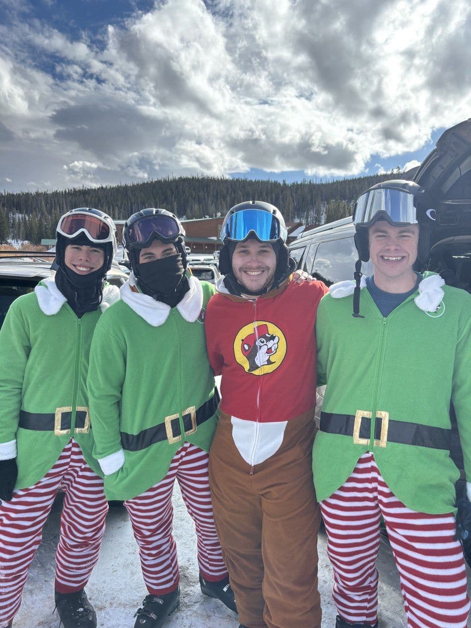 David and friends in costumes on a ski day