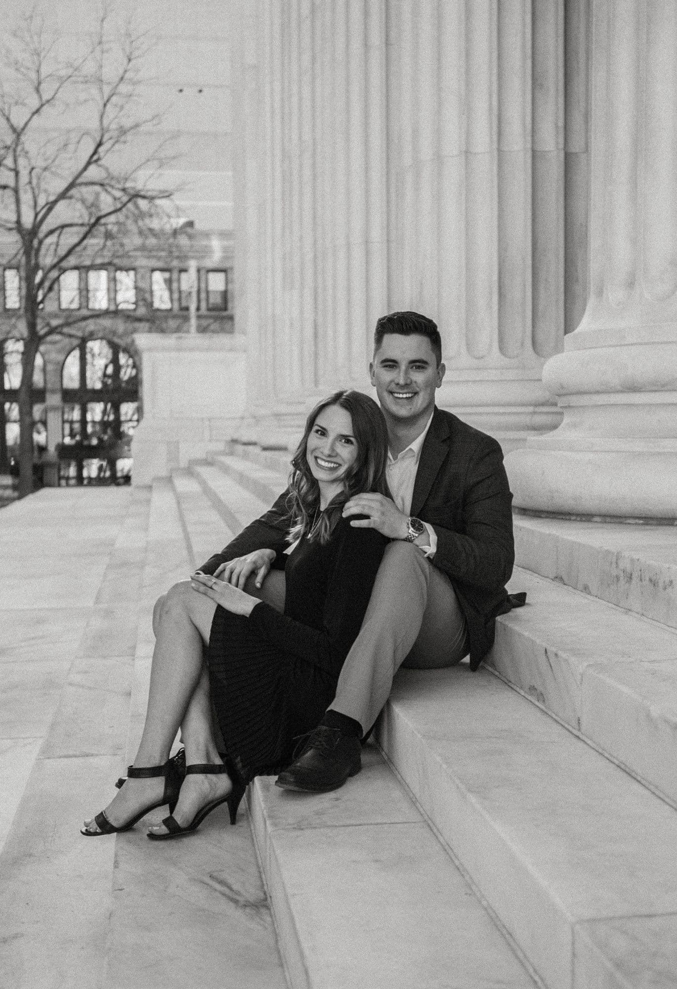 David and Rebekah sitting on stone steps, in black and white
